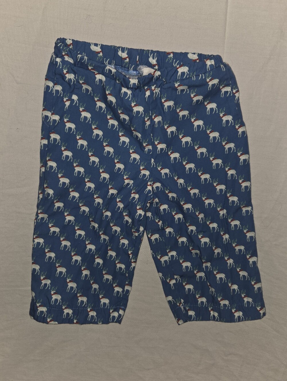Lila And HayesBlue Pants with White Reindeer Print